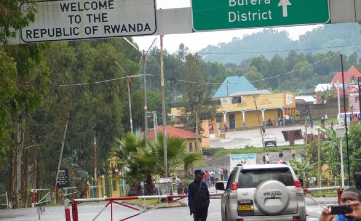 Vehicle passing through the main gate at the Katuna/Gatuna border crossing between Uganda and Rwanda, symbolizing the border reopening for regional travel.
