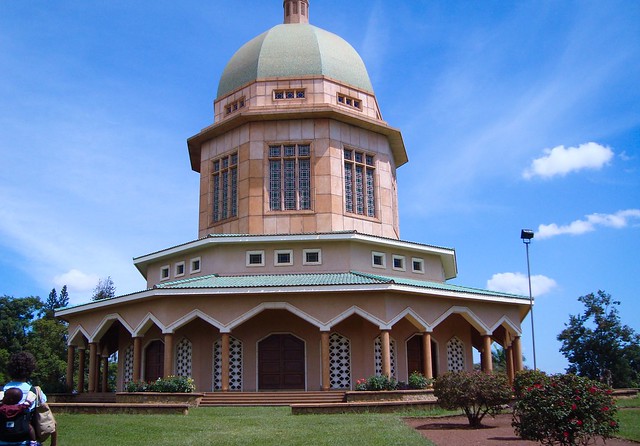 Exterior view of the beautiful Baháʼí House of Worship (Mother Temple of Africa) with its dome and manicured gardens in Kampala, Uganda.