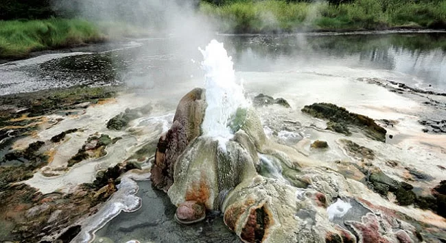 The gushing eruption of the Kanangorok Hot Springs in the northern section of Murchison Falls National Park, Uganda, a unique geothermal attraction