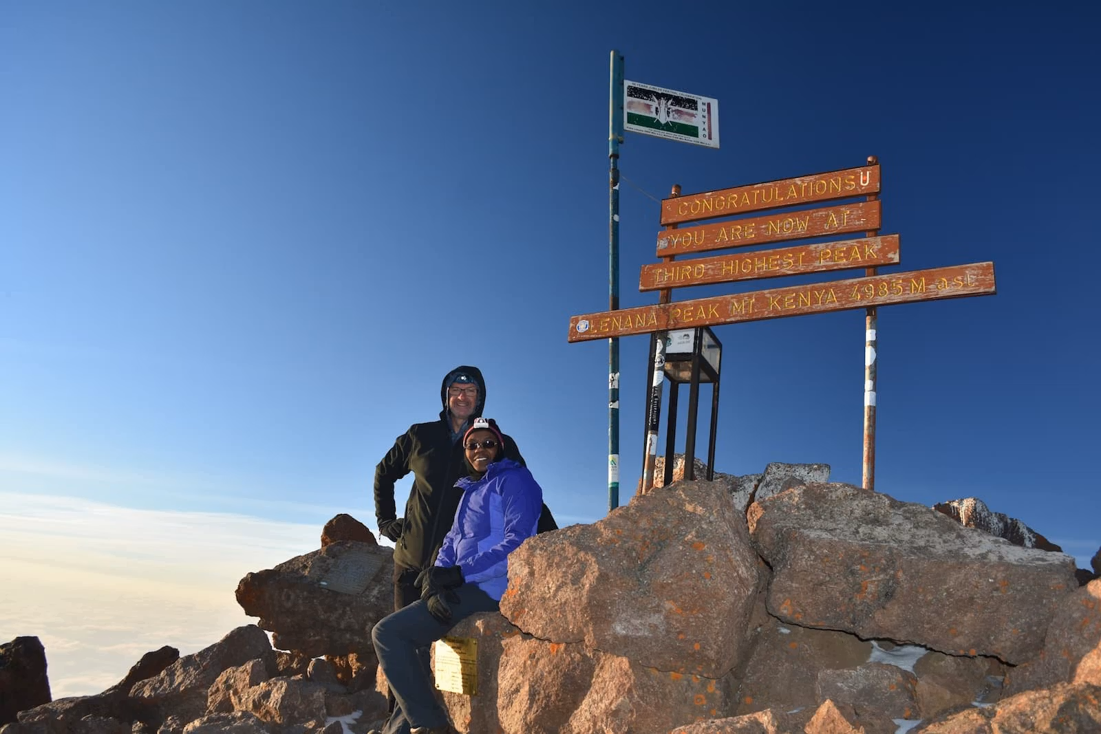 Trekkers at Point Lenana summit on Mount Kenya at 4,985 metres